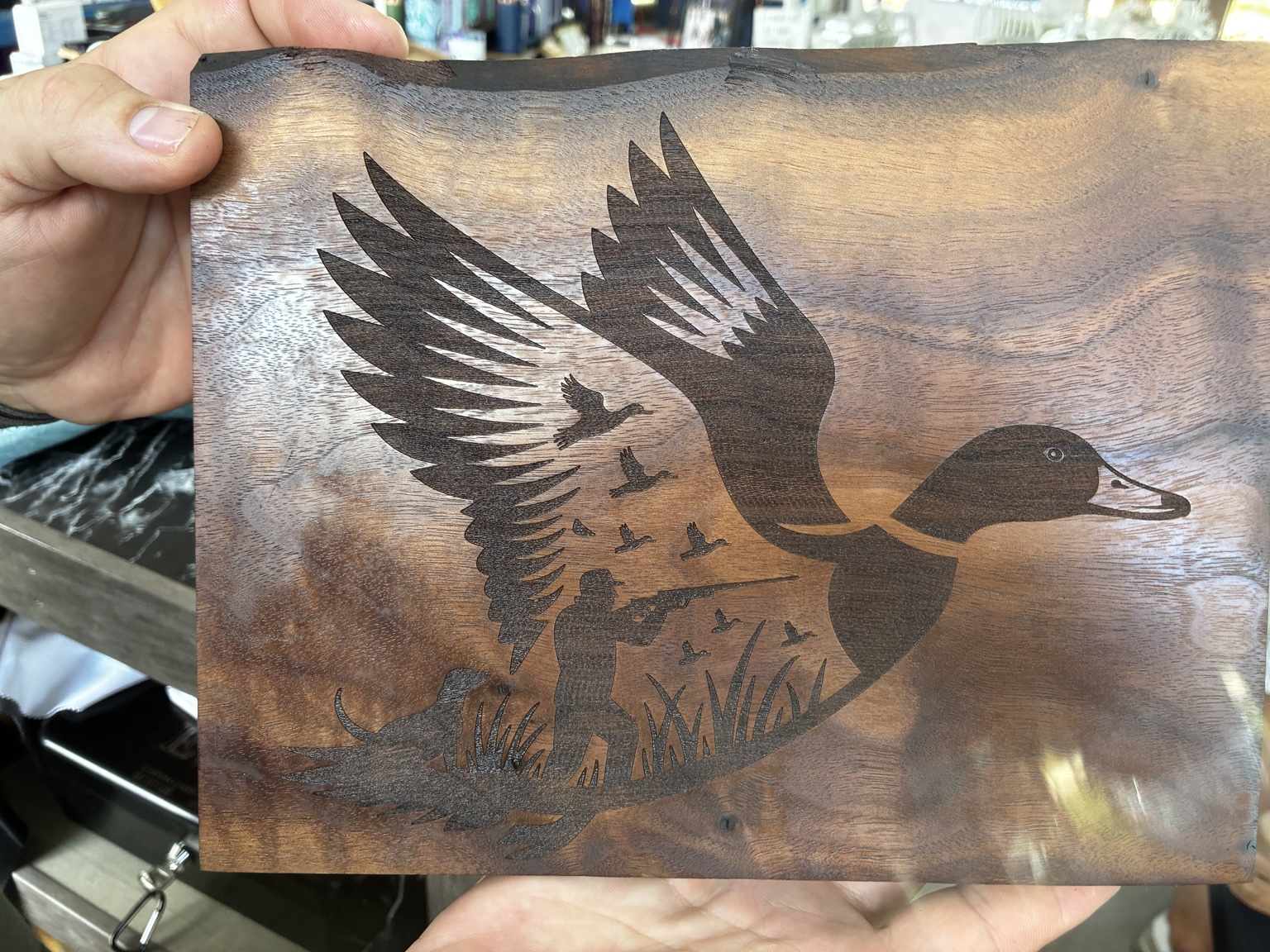 Duck hunting engraving on wood